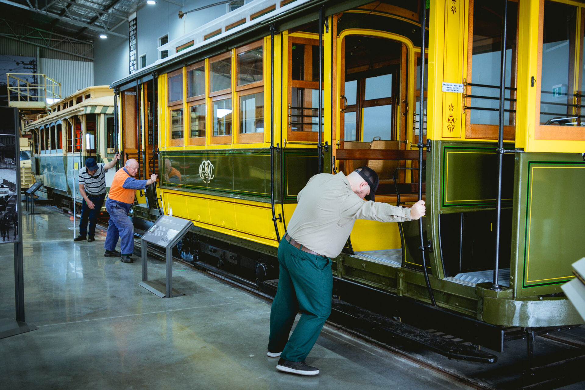 Geelong Tram No. 2 is only used a couple of times each year. On Australia Day 2025 a small team of four pushed it outside ready to take passengers.