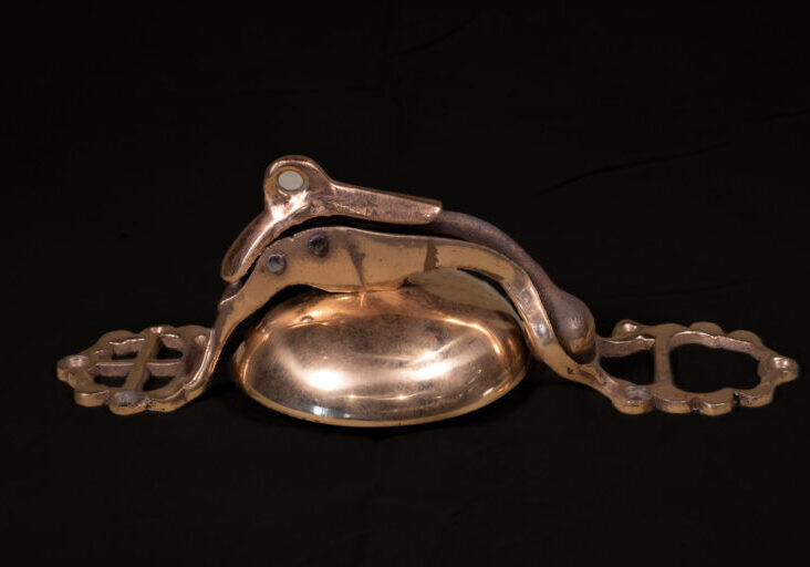 The bell is mounted in the driver's cabin, and activated with a leather pull cord by the conductor.