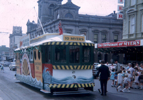No. 21 lets off school children outside the Myers Store, November 1968. It was necessary for the crew to control the traffic as the children were let off on the "wrong side" for the tram stops in Sturt St. Normally passengers boarded and alighted into the Sturt St. median strip.

Photo Theo Dunstan.