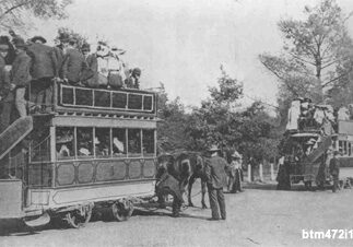 Two horse trams at the Gardens c1900. The advertisement on the modesty panel on the top deck of the nearest tramcar No. 1 has been altered to remove the offending material.