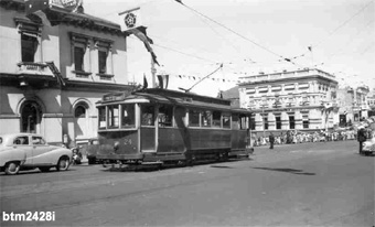 Sturt St was closed for the "Royal Progress". Tram No. 24 is shunting at the Lydiard St North crossover. In the background the buildings are decorated for the occasion. Photo Keith Kings 6-3-1954.